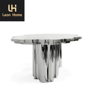 Mobilier de maison sur mesure table de banquet au design unique grande table à manger de luxe moderne italienne en acier inoxydable à la feuille d'argent