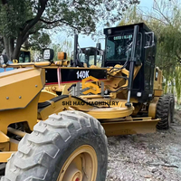 Niveleuse à moteur CAT 140K d'occasion en excellent état, engin de construction lourd pour la construction routière et les travaux de terrassement