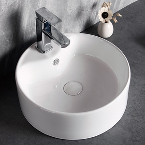 อ่างล้างหน้าเซรามิคทรงกลม BOAJJ แบบตั้งบนเคาน์เตอร์ รูเดียว สีขาวทันสมัย - Product Image 1