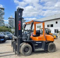 Forklift Bekas Terlaris TCM FD70 7 Ton Diesel Internal Combustion 4WD Ban Solid Mesin Isuzu Pengangkat Hidrolik