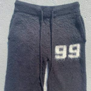 กางเกงโมแฮร์สีพื้นแบบสั่งทำ OEM กางเกงวอร์มถักไหมพรมสำหรับฤดูหนาว กางเกงขายาวทรงบานขนฟูสำหรับผู้ชาย กางเกงโมแฮร์ขากว้าง - Product Image 5