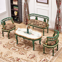 Chaise de canapé en bois massif de style européen petit appartement salon simple table à thé ensemble de combinaison de balcon peint pour l'extérieur