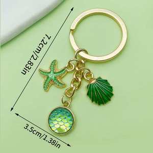 Llaveros personalizados <span class=keywords><strong>de</strong></span> la serie Ocean con conchas, estrellas <span class=keywords><strong>de</strong></span> mar y pez payaso: Un regalo para el chico <span class=keywords><strong>de</strong></span> la <span class=keywords><strong>novia</strong></span> - Product Image 5
