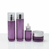 Botol Toner Kosmetik Silinder Kaca Ungu Baru 50ml/100ml dengan Pompa untuk Perawatan Kulit Serum Krim Mata Krim Wajah Tutup Sekrup Pengunci