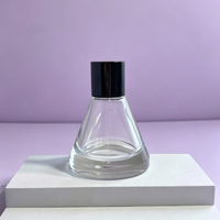 Flacon de parfum de luxe conique noir 10ml 50ml avec pulvérisateur à brume fine et bouchon en pierre, couleur personnalisée