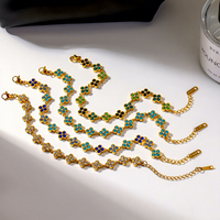 Ensemble collier et bracelet trèfle à quatre feuilles en diamant précieux haut de gamme pour femmes, en acier inoxydable et zirconium, vente en gros d'usine