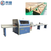 Ligne de production automatique de charpentes en bois avec scie à découper à angle variable CNC pour la fabrication de maisons en bois