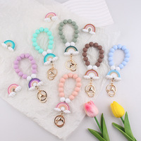 Neu Eingetroffenes Silikon-Regenbogen-Perlenarmband Schlüsselanhänger für Frauen Elastisches Armband Schlüsselring Autoschlüsselhalter Rucksack-Anhänger