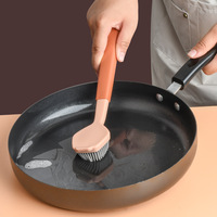 Brosse à vaisselle multifonctionnelle 2-en-1 en silicone pour nettoyage en profondeur, avec manche long antidérapant et pointe grattoir anti-rayures pour la cuisine