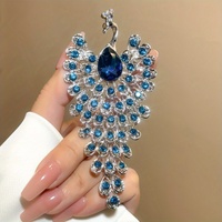 Broche de luxe pour femme, style cour, motif paon en strass, accessoire de vêtement pour costume et manteau, bijou cadeau pour couple, idéal pour les fêtes