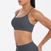 Sujetadores deportivos de yoga para mujer al por mayor, con tirantes finos cruzados en la espalda, sin costuras, con almohadillas extraíbles, ideales para fitness, pilates y entrenamiento.