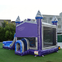 Château gonflable commercial avec toboggan et piscine pour enfants, idéal pour les fêtes en plein air