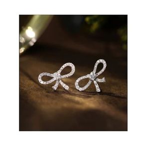 Xinfly New Design Woman 18k Original Jewelry Gold and Natural Diamond <b>Stud</b> Earrings <b>Small</b> Diamond Bows Earrings - Product Image 1
