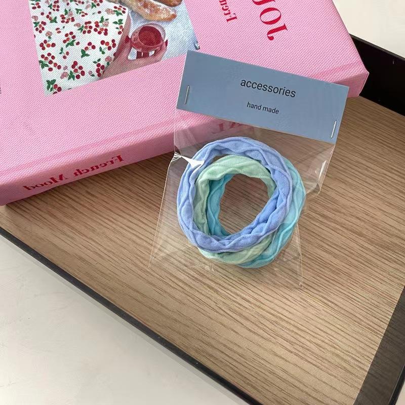 4ชุดสีฟ้าหนึ่งการ์ดที่มีสามแถบ