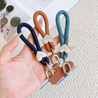Cordon tressé pour téléphone avec boucle cœur esthétique, dragonne de poignet, lanière et breloque anti-perte pour iPhone Samsung