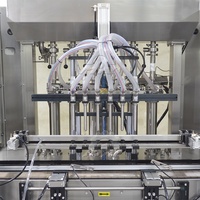 Machine de remplissage de bouteilles en plastique de pot en verre de pâte liquide de piston servo