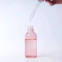 Emballage cosmétique de luxe en verre rose de 5ml 10ml 15ml 20ml 30ml 50ml 100ml flacon compte-gouttes de sérum d'huile essentielle avec dessus en or rose
