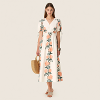 Robe d'été mi-longue personnalisée OEM ODM pour femme, imprimé floral crème, col en V, manches bouffantes, taille élastique, coupe trapèze