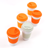 Tasse en céramique de couleur personnalisée de haute qualité au design anti-brûlure tasse à café avec couvercle en silicone