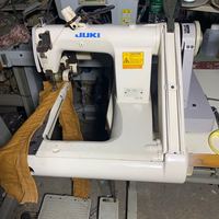 Machine à point de chaînette à double aiguille Juki-1190m d'occasion, alimentation par le bras
