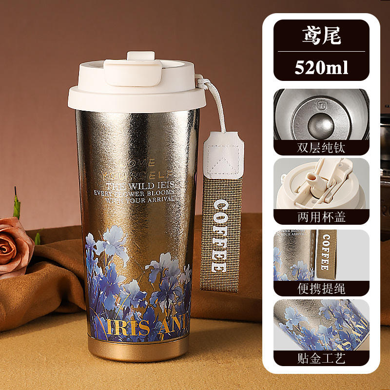 Pure titanium coffee cup with butterfly design and gold leaf application.