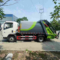 Camion à ordures compacté SINOTRUCK 4*2 d'une capacité de 6 m³, conçu pour l'Afrique avec une réduction de 20 %