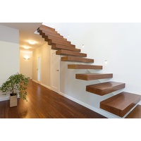 Système d'escalier flottant moderne en métal intérieur personnalisé CBMmart avec balustrade en verre