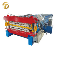 Machine de formage à froid de tôles de toiture ondulées à double couche