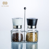 Ensemble de moulins à sel et à poivre de luxe avec support métallique, shaker à épices en verre, moulin manuel en céramique pour la vente en gros aux restaurants