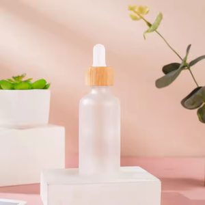 Botellas de Vidrio Esmerilado al por Mayor para Aceites Esenciales, Envases Cosméticos Vacíos Ámbar/Transparentes con Tapa de Madera de Bambú - Product Image 4