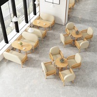 Ensemble de mobilier commercial multifonctionnel de style nordique moderne pour restaurant, café, bar à thé, réception et négociation, avec combinaison table et chaise
