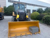 Bodi kekuatan tinggi XC870K 2500kg traktor Loader Backhoe TBL 4x4 multiguna untuk gudang/situs logistik Finishing