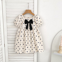 Robe d'été pour filles, imprimé cœur blanc, nœud noir, manches courtes bouffantes, robe de princesse pour tout-petits, mignonne, décontractée, vêtements d'été pour enfants