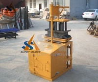 Machine manuelle de fabrication de briques en béton de production chinoise