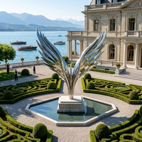 Grande installation artistique en métal pour extérieur, sculpture d'aile abstraite moderne en acier inoxydable sur mesure pour hôtel, villa, centre d'affaires