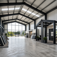 Bâtiment d'entrepôt industriel en acier à ossature portique à double pente, conception à grande hauteur, charge de toiture de plus de 20 lb/pi², résistance au vent de plus de 121 mph