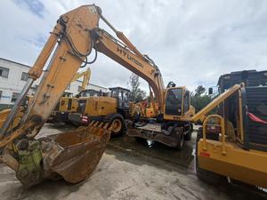 Excavatrice sur pneus Hyundai 210W-7 d'occasion de haute qualité, d'origine Corée du Sud, machine de terrassement d'occasion à vendre - Product Image 2