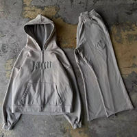 Ensembles d'impression OEM personnalisé unisexe poids lourd respirant Streetwear à capuche et pantalons de survêtement évasés Winter Puff du fabricant