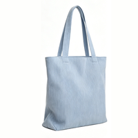 Sac fourre-tout en toile de velours côtelé texturé, brodé d'une lettre monogrammée, idéal pour le transport quotidien et les sorties décontractées