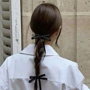 High-end black <b>bow</b> hair <b>clip</b>, Korean style, simple and versatile hair accessory, elegant and minimalist. - Product Image 1