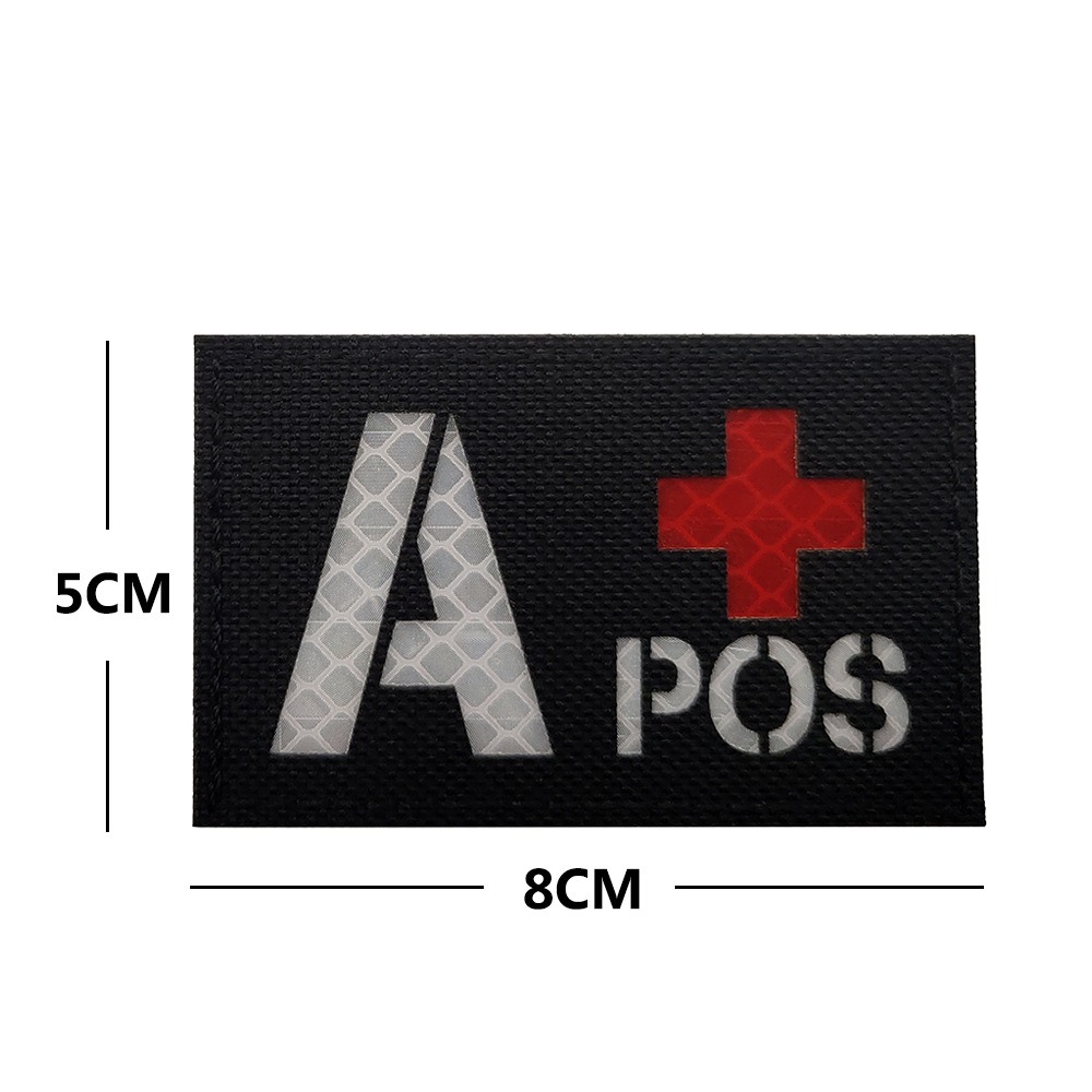 Black cloth with white letters A+