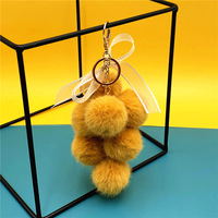 Porte-clés créatif en peluche en forme de pamplemousse, pendentif mignon pour sac, avec nœud en dentelle et boule de fourrure, pour clés de voiture