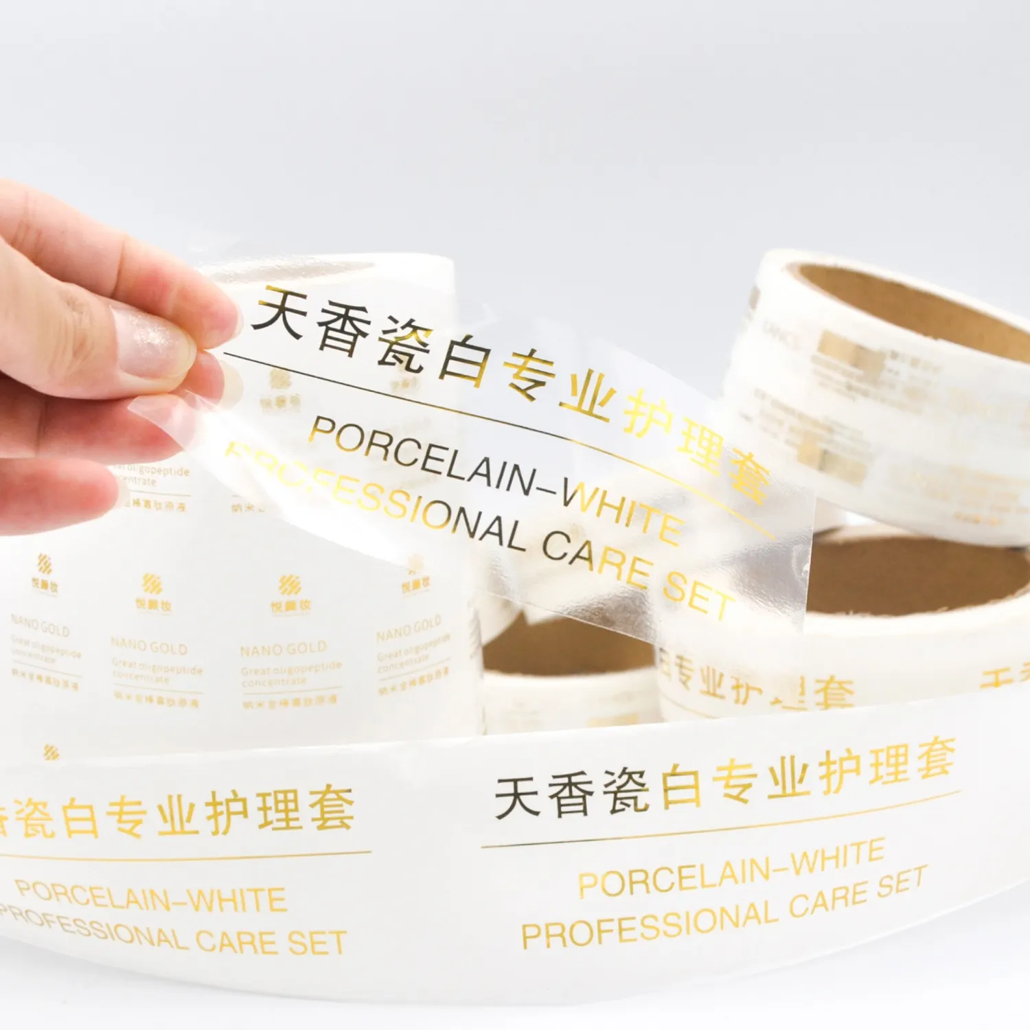 Kendinden yapışkanlı özelleştirilmiş baskı temizle altın folyo çıkartmalar şeffaf Logo etiketi