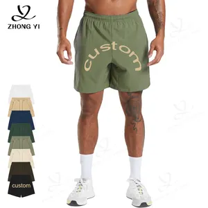 Streetwear d'été à logo personnalisé Jogging de sport à séchage rapide Short surdimensionné pour homme avec cordon de serrage