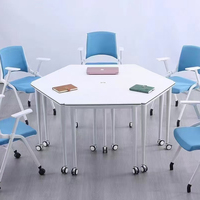 La combinaison de table de formation de conférence pliante à hauteur réglable peut déplacer le double bureau de formation et les chaises utilisées pour les écoles