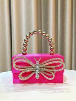Sacs de soirée de luxe en forme de papillon, avec nœud en strass, pochette de mariage pour mariée, chaîne de perles, doublure en polyester, style tendance