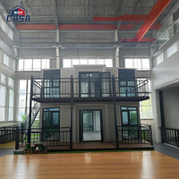 Maison conteneur pliable à double aile de 40 pieds, prête à l'emploi, cabine préfabriquée, chambre à coucher extensible, villa conçue pour le panneau sandwich en acier