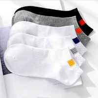 Chaussettes de sport absorbant la sueur respirantes de couleur unie à prix bon marché Chaussettes de bateau noires blanches et grises