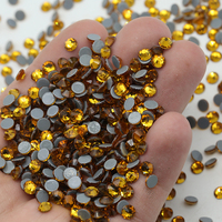 XULIN vente en gros plus de 100 couleurs strass ronds Flatback pierres de cristal correctif verre strass pour la décoration de vêtement