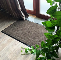 Système de tapis d'entrée double couche en PVC pour le piégeage de la boue dans les vestibules du complexe de bureaux